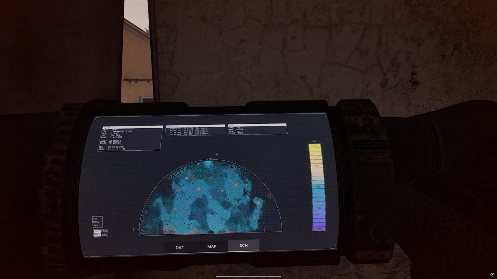 An operator's wrist PDA showing a blue radial scanner display in a dark wooden room