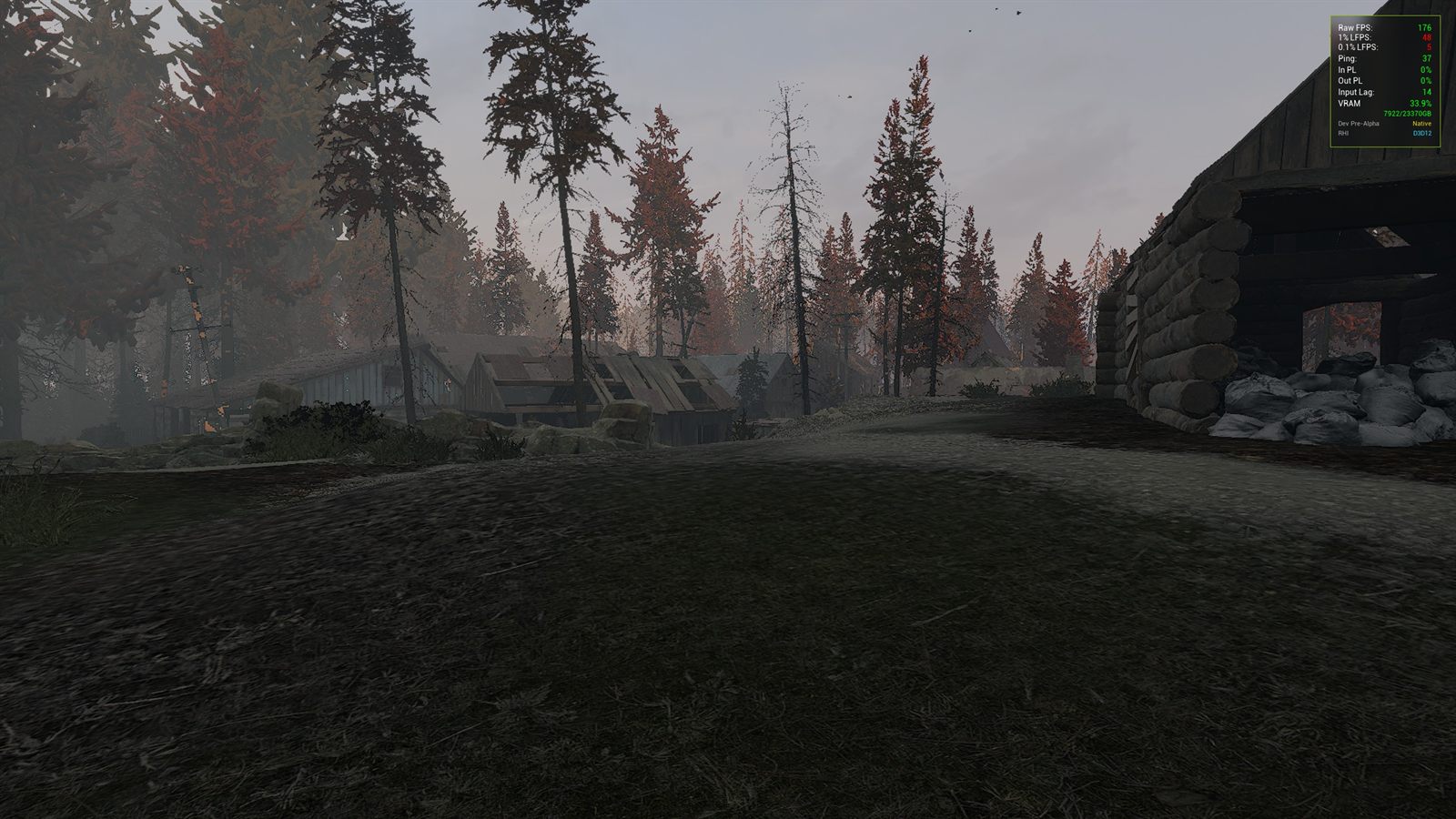 A forest clearing beside a log cabin with sandbags, a performance counter in the top right corner