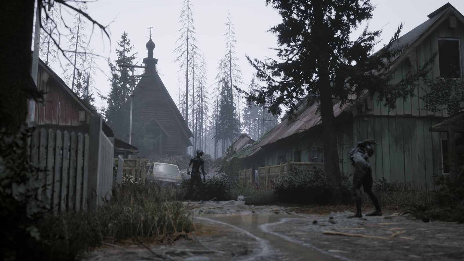 A dead village street under bare trees, a church spire in the fog, two figures moving between the houses